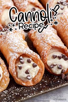 chocolate chip covered pastry rolls on a tray with the words cannoli recipe written above them