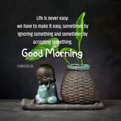 a buddha statue sitting next to a potted plant with a quote about good morning