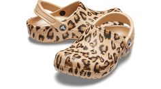 Original. Versatile. Comfortable.The iconic clog that started a comfort revolution around the world, now with fun new graphics, including elegant and tropical florals and leopard print! Crocs Classic Clogs offer lightweight Iconic Crocs Comfort™, a print for every personality, and an ongoing invitation to be comfortable in your own shoes.  Classic Printed Clog Details:    Incredibly light and fun to wear  Ventilation ports add breathability and help shed water and debris  Easy to clean and quick Summer Slip-resistant Clogs, Tropical Florals, Crocs Classic Clogs, Shoes Classic, Tropical Floral, Strap Heels, Black Floral, Clogs, Baby Shoes