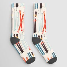 Our socks help you express your personality all the way down to your toes. The seamless design and unique printing process means your favorite design will appear in vivid color without any base color peeking through. Plus, they are made from a soft cotton/poly blend for stretch and comfort--one size fits most. Available in one, two or three pair sets.  Keywords: Gesture, Office supplies, Font, Electric blue, Logo, Art, Graphics, Writing implement, Brand, Cylinder, Illustration, Graphic design. Ski Illustration, Aurora Borealis Painting, Bee Sock, Valentines Socks, Fox Socks, Mustard Rug, Navy Socks, Orange Socks, Van Gogh Almond Blossom