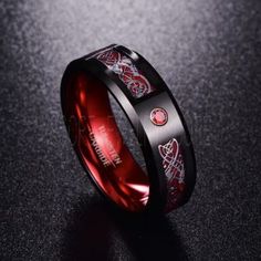 Red Ring, Red Tungsten Ring, Red Wedding Band, Black Tungsten Ring with Red Carbon Fiber and AAAAA Red CZ Stone Inlay Ring Custom made to order:  Ships in 2 - 4 weeks! We can create any ring design, logo, symbol, text, font, and matching couple sets. WE STRONGLY RECOMMEND THAT YOU GET YOUR FINGER PROFESSIONALLY MEASURED BEFORE PLACING YOUR ORDER.   Need help figuring out your ring size?  Visit http://www.findmyringsize.com CUSTOM ORDERS (CUSTOM ENGRAVING) ARE FINAL SALE AND DO NOT QUALIFY FOR R Unique Gifts For Couples, Celtic Dragon, Black Tungsten Rings, Viking Ring, Dragon Ring, Tungsten Carbide Rings, Stone Inlay, Wolfram, Amethyst Purple