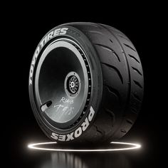 a close up of a motorcycle tire on a black background with the words boxes written on it