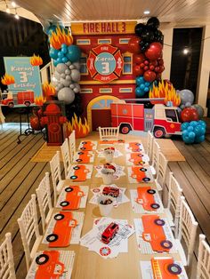 Firetruck backdrop with balloons and styled kids table Fireman Birthday Theme, Firetruck Themed Birthday, Fire Birthday Party Ideas, Firetruck Party Ideas, Firefighter Party Ideas, Firetruck Theme Birthday Party, Firebuds Themed Birthday, Firefighter Birthday Party Decorations, Firefighter Themed Birthday Party