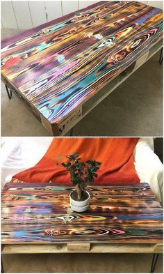 a table made out of wood and painted with different colors