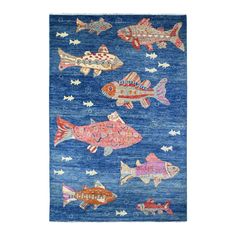 a blue rug with fish on it