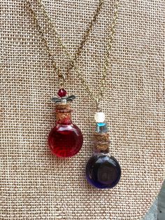 mini Potion bottle necklaces great for Halloween outfit or just as a jewelry item All handmade  Food coloring and mineral oil used as  Potion Wired Rings, Handmade Food, Car Charms Mirror, Bottle Pendant, Bottle Jewelry, Bottle Necklace, Potion Bottle, Halloween Outfit, Bag Clips