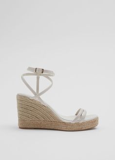 Espadrille sandals crafted from soft leather featuring slightly padded straps for comfort. Set on natural jute wedges grounded with rubber for grip. Finished with buckle-fastening ankle straps for adjustable fit. Heel height: 10cm / 3.9"Height at toe: 3cm / 1.2" Strappy Block Heel Sandals, White Espadrilles, Strappy Block Heels, Ankle Strap Sandals Heels, Buckled Heels, Leather Espadrilles, Graduation Outfit, Strappy Sandals Heels, Black Sandals Heels