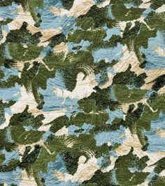 an abstract camouflage print fabric in blue and green