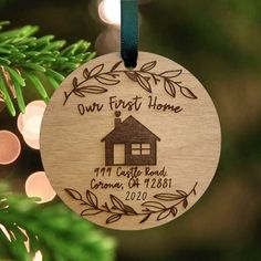 a wooden ornament hanging from a christmas tree