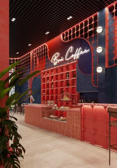 the interior of a restaurant with red and blue walls