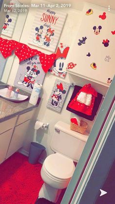 the bathroom is decorated in minnie mouse theme