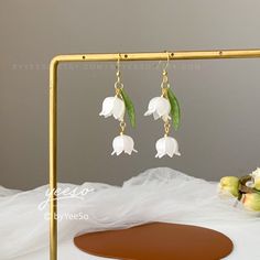 Lily of the Valley Earrings, flower dangle earrings, Unique Gift For Her 🤍 Hypoallergenic 🌸 Handmade with love ✨ Cute & Dainty  🎁 Gift ready 〰️Click👇🏻 Find more Earrings🎀  https://www.etsy.com/shop/byYeeSo ◽️ PACKAGING ◽️  * The jewelry will be nicely packaged * Comes with a drawstring suede pouch * If you need personalized gift note, please click the link below, add it to your cart when check out to upgrade your packaging. https://www.etsy.com/listing/1008661207/upgrade-gift-packaging?ref=shop_home_active_1&frs=1 ◽️ SHIPPING ◽️ * USPS First Class Shipping Service with tracking number * All products will be shipped from USA ◽️ CARE INSTRUCTIONS ◽️ * Avoid perfumes or sprays * Avoid getting your jewelry wet * Wipe down the jewelry to remove oils and prevent tarnish * Store jewelry in Delicate Dangle Earrings With 3d Flowers, Lily Of Valley Earrings, Nature-inspired Hypoallergenic Flower Drop Earrings, Lily Flower Earrings, Nature-inspired Hypoallergenic Flower Dangle Earrings, Shrink Plastic, Wet Wipe, Cute Little Things, Unique Gifts For Her