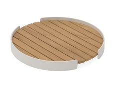 a round wooden tray with white trimmings on the bottom and an open lid