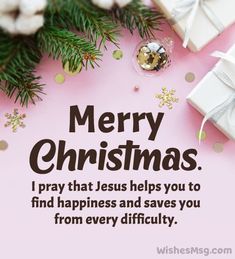 a pink christmas card with presents on it and the words merry christmas i pray that jesus helps you to find happiness and saves you from every