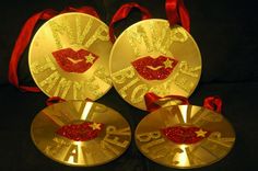 three gold plates with red glitter on them and the words kiss me do not know