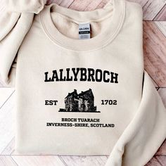 Lallybroch T-shirt Sweatshirt Hoodie, Outlander Gifts, Outlander Shirt, Take Me Home to Lallybroch, Fraser's Ridge, Lallybroch Unisex Shirt Welcome to VEPStore ----- T-shirts ----- For Solid Colors : We Use Gildan 5000 Or Gildan 2000 Tee To Print The Design. They Are 100% Cotton Except Ash - 99% Cotton And 1% Polyester, For Heather Colors We Use Bella Canvas Tee To Print The Design. They Are 52% Cotton, 48% Polyester (Athletic Heather And Black Heather Are 90% Cotton, 10% Polyester) ----- Hoodie Outlander Tshirt Ideas, Outlander Shirt, Outlander Gifts, Custom Printed Shirts, Bella Canvas Tees, Gildan Sweatshirts, Take Me Home, Men Fits, Hoodie Design