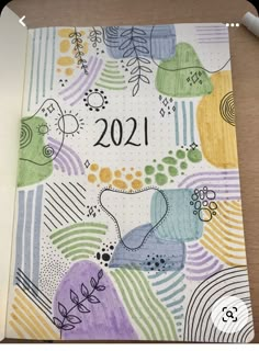 a notebook with the word 2021 written on it