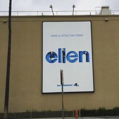 an advertisement for ellen on the side of a building