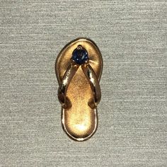 Very Rare. Solid 14kt Yellow Gold. Genuine Authentic Designer Na Hoku Hawaii. Stamped With Na Hoku Hallmark And 14k. Natural, Round Cut, Blue Sapphire Gemstone Slipper Flip Flop Sandal Pendant. Modeled On A Neck Chain To Show Size And Scale, Chain Is Not Included. The Slipper, Or Flip Flop, Is An Essential Part Of The Island Lifestyle. Perfect For A Necklace. Sapphire Is The September Birthstone. An Amazing Gift. Don’t Need To Sell. No Offers Please. Island Lifestyle, Necklace Sapphire, Island Life Style, Blue Sapphire Gemstone, Neck Chain, September Birthstone, Sapphire Gemstone, Flip Flop, Flip Flop Sandals