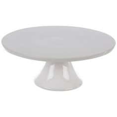 a white cake plate on a white background