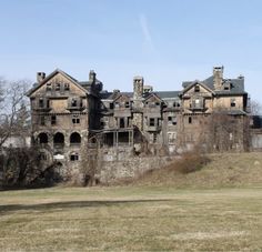 an old abandoned building in the middle of nowhere