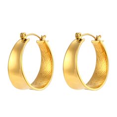 Introducing the Groove is in the Hoop Earrings, where classic elegance meets modern design! These stunning hoops feature a unique textured interior that catches the light with every move, adding an unexpected twist to the traditional hoop earring. Crafted from high-quality stainless steel and finished with a luxurious 18K gold coating, these earrings are both hypoallergenic and durable, perfect for daily wear. The Groove is in the Hoop Earrings are designed to elevate any outfit, whether you’re Luxury Traditional Small Hoop Earrings, Luxury Hoop Earrings With A Modern Twist, Luxury Hypoallergenic Elegant Hoop Earrings, Luxury Hinged Modern Hoop Earrings, Luxury Elegant Design Hoop Earrings, Luxury Modern Hoop Earrings With Gold-tone Hardware, Classic Luxury Hoop Earrings, Luxury Gold Hoop Jewelry, Luxury Hoop Earrings With Plating