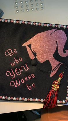 a decorated graduation cap with the words be who you wanna be