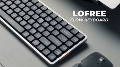 a keyboard and mouse on a desk with the words lofree flow keyboard above it