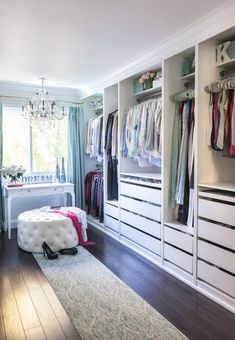 the closet is full of clothes, shoes and other things to wear in this room