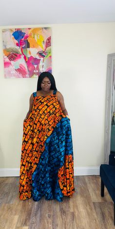 African ankar maxi dress with exotic patterns, flattering on all skin tones. Gorgeous, Regal, Beautiful, Bold!  This African print goes from day to night with ease. Available in plus sizes as well.  Authentic African Print Dress for Women / Ladies. African Print Summer Dress, Ankara Maxi Dresses, Gold African Maxi Dress, Sleeveless African Maxi Dress, African Dresses for Special Events, Regal African Dress, Long African Gown, High Quality African Dresses. Bust size 42-45 Length 62 inches  -------------- DETAILS: Fabric: Authentic African Print Cotton  2 pockets Model wears a large  Fabric: African Print Cotton Blue Ankara Fabric Maxi Dress, Sleeveless Ankara Fabric Maxi Dress For Summer, Sleeveless Summer Maxi Dress In Ankara Fabric, Bohemian Multicolor Ankara Maxi Dress, Multicolor Sleeveless Ankara Maxi Dress, Maxi Dress Ankara, African Maxi Dress, African Gowns, Ankara Maxi Dress