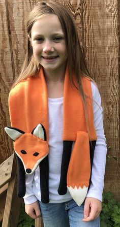 What DOES the fox say? Youll hear lots of oohs and aaahs wearing this fellow! Make your own with this 7 page full sized pattern complete with detailed written instructions PLUS pictures. This guy is made from fleece any size up to 60 inches! If youve sewn with fleece before it will Animal Scarves, Sew Toys, Fox Stole, What Does The Fox Say, Woodland Animals Theme, Fox Scarf, Sewing Pins, Puppy Snuggles, Rag Quilts