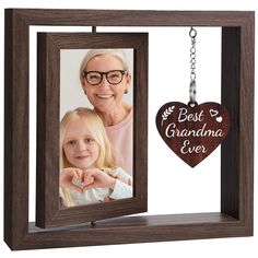 PRICES MAY VARY. Gifts for Grandma: Our picture frame is the perfect gifts for Grandma, Nana from granddaughter and grandson. A lovely keepsake that record the happiness between grandkids and grandparent. Great for Grandma Christmas Gifts, Thanksgiving Gifts, Mothers Day Gifts, Birthday Gifts, etc. Creative Design: This gift for grandmother and grandfather features a 360° rotating picture frame and a heart-shaped wood sign hanging beside. It allows you to display 2 photos simultaneously. Creativ Chridtmas Gifts For Grandparents, Christmas Gift For My Grandma, Grandm Gifts, Creative Birthday Gifts Fir Grandma, Creative Birthday Gifts For Grandma, Christmas Gifts For Granparents, Anniversary Picture Frame, Touching Words, Gifts For Grandma