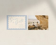 an image of save the date card with two birds on rocks in front of water