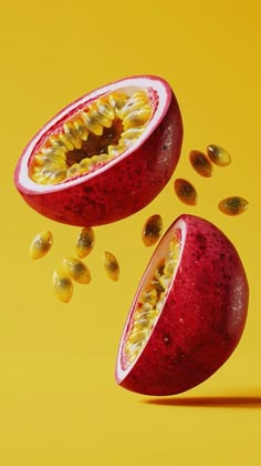 an open pomegranate on a yellow background with seeds coming out of it