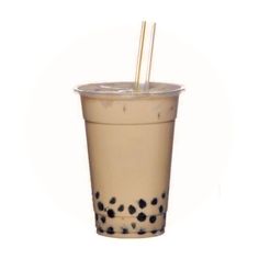 a plastic cup with a straw in it and polka dots on the side, sitting on a white surface