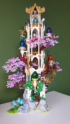 there is a very tall tower with lots of things on the top and below it