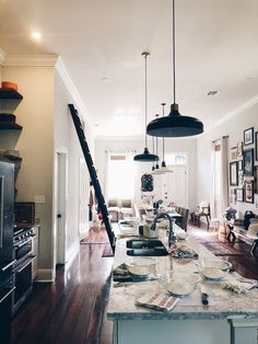 an instagram photo of a kitchen and living room