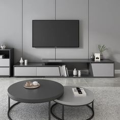 a living room with two tables and a television