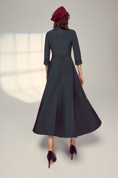 An elegant full skirted dress, the Silk Cowl Neck Riding Dress in Forest is softly tailored from our signature high quality Italian silk crepe, which has a wonderful fluidity, weight and drape. A rounded cowl neck collar falls beautifully to expose the décolletage and frame the face. Featuring 3/4 length sleeves with a fixed cuff and a full skirt which dips down at the back, this dress has a centre-back invisible zip for step-in ease, and is fully lined in silk. Style with soft grey, navy, or me Elegant Fit And Flare A-line Evening Dress, Elegant A-line Dresses With Pleated Waist, Classic A-line Maxi Dress For Formal Occasions, Elegant Satin A-line Dress, Formal A-line Tea Length Dress With Pleated Bodice, Elegant A-line Tea Length Cocktail Dress, Elegant A-line Maxi Dress With Fitted Bodice, Elegant Fitted A-line Tea Length Dress, Chic Formal Midi Dress With Full Skirt