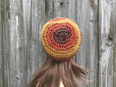 "Style: Leighton Slouch Hat- a slouchy crochet beanie. Color: This sample hat is shown in Hazelnut, rich browns, golden mustard and orange. Sizes: One size fits 20\" to 23\" (50.5 cm to 58 cm) head size. Fiber Content: 70% acrylic, 30% wool. Characteristics: Soft, slouchy, trendy. Care Instructions: Hand wash, dry flat. Every item from Pixiebell is handmade and knit or crocheted to order, unless otherwise stated in title of the item as \"ready to ship\". Production time may vary, please check th Brown Crochet Hat With Curved Brim For Fall, Brown Crochet Cap For Fall, Slouchy Brown Crochet Hat For Fall, Brown Crochet One Size Hat, Brown Crochet Cap Hat, Slouchy Brown Crochet Hat Handmade, Bohemian Brown Hand-knitted Crochet Hat, Bohemian Brown Beanie, Bohemian Brown Yarn Beanie