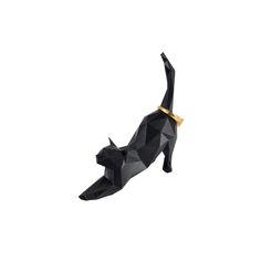 a black and gold cat figurine on a white background