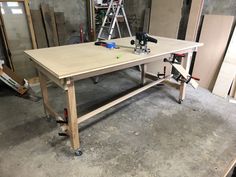 a workbench with tools on it in a garage