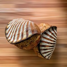 two loaves of bread sitting on top of each other