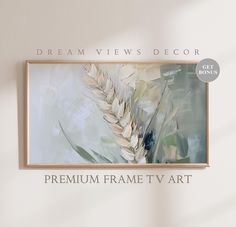 a painting hanging on the wall above a vase with flowers in it and text that reads, dream views decor premium frame tv art