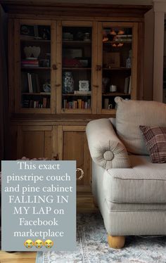 a living room with a chair and bookcase