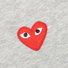 The concept of the Comme des Garcons PLAY line is design by not designing. Characterized by the iconic red heart logo designed by artist Filip Pagowski, the line is a collection of unisex basics, fragrances, and footwear for those who enjoy simplicity. Pictured is the Comme des Garcons PLAY Women's Hoodie in Grey. AZ T169 051 1 COMME DES GARCONS PLAY APPAREL HAS A SMALLER FIT, WE RECOMMEND SIZING UP. 100% Cotton Ribbed cuffs and hem Kangaroo pocket Embroidered CDG heart logo Style no: AZ-T169-05 Cdg Heart, Filip Pagowski, Comme Des Garcons Play, Heart Logo, Japan Style, Fashion Logo, Japan Fashion, Comme Des Garcons, Grey Hoodie