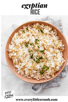 a bowl filled with rice on top of a table