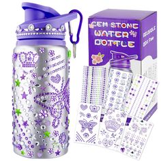 a purple water bottle with stickers on it next to a box and some other items