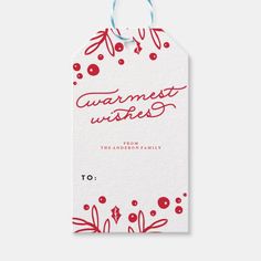 a red and white christmas gift tag with the words, sweet wishes on it's side