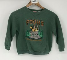 90's Winnie The Pooh Mickey Inc Unisex Kids Green Cotton/Polyester Sweatshirt M Description 90's Winnie The Pooh Mickey Inc Unisex Kids Green Cotton/Polyester Sweatshirt M Product Detail •                   Brand : Mickey Inc •                   Size: M •                   Color: Green  •                   Material:  Polyester & Cotton Measurements •                   Shoulder: 17 •                   Chest: 17 •                   Waist: 15 •                   Length: 17 •                   Sleev Vintage Kids Clothes, Pullovers Outfit, Vintage Kids, Disney Kids, Green Material, Kids Sweater, Crew Sweatshirts, Disney Outfits, Fit Inspo